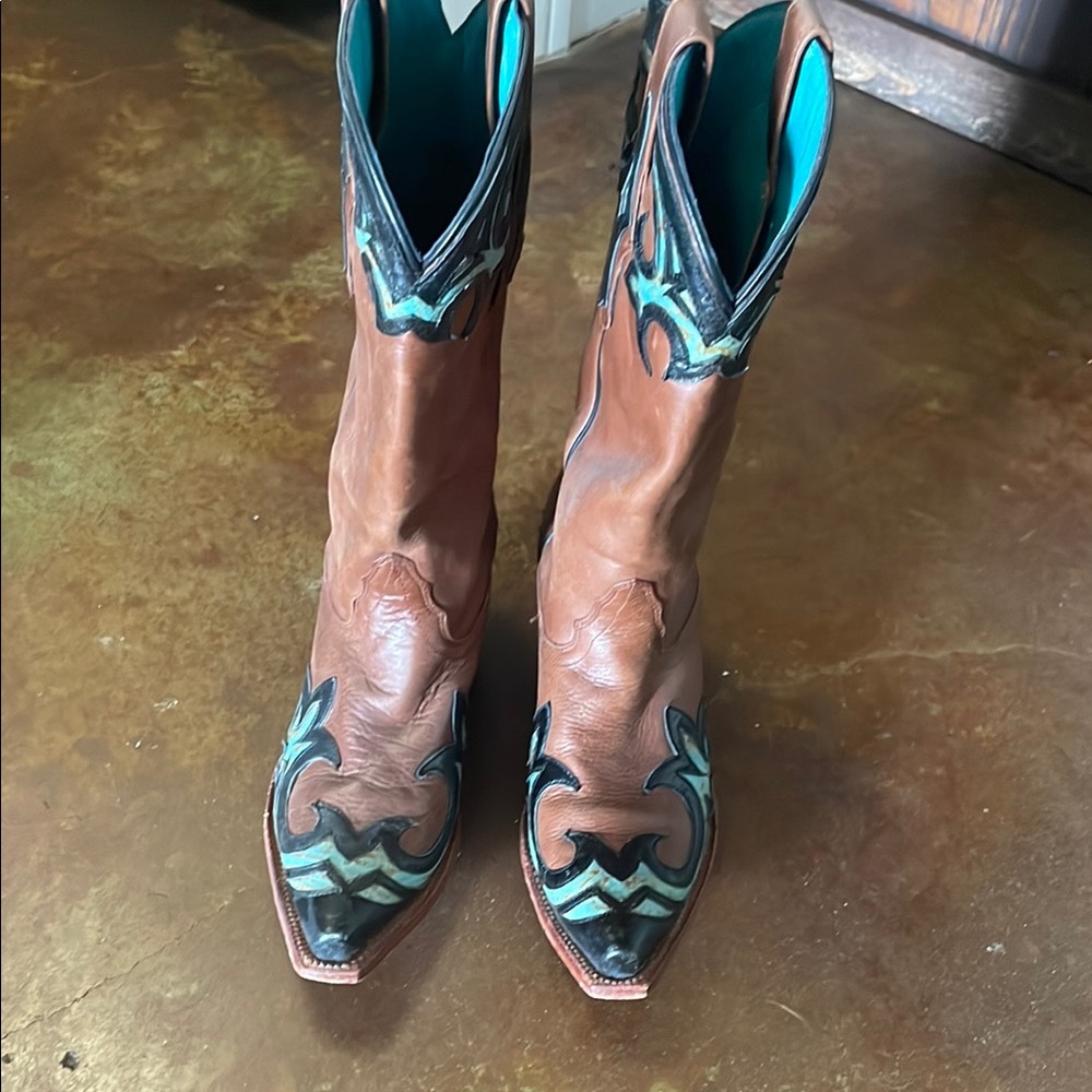 Tony Lama Brown and Green Heeled Boots with Intricate Stitching